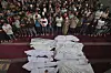 Mourners pray over the bodies of Palestinians killed in an Israeli military airstrike that hit a U.N. school, during a funeral in Jabaliya, northern Gaza Strip, on May 12, 2025. [AP/YONHAP]