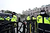 Police officials guard the entrance to the Constitutional Court on the day of its ruling on President Yoon Suk Yeol's impeachment on April 4. [YONHAP]