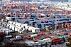 Containers are stacked at a port in the southeastern city of Busan in this file photo taken on Jan. 28.  [YONHAP]