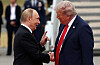 U.S. President Donald Trump, right, shakes hand with Russian President Vladimir Putin, as they meet to negotiate for an end to the war in Ukraine, at Joint Base Elmendorf-Richardson in Anchorage, Alaska, on Aug. 15. [REUTERS/YONHAP]