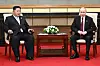 In this pool photograph distributed by the Russian state agency Sputnik, Russian President Vladimir Putin, right, and North Korean leader Kim Jong-un meet after attending a military parade marking the 80th anniversary of victory over Japan and the end of World War II, in Beijing, on Sept. 3. [AFP/YONHAP]