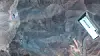 A satellite image made available by Maxar Technologies shows a closer view of craters and ash on a ridge at the Fordo underground uranium enrichment following U.S. airstrikes, in Iran on June 22. The U.S. forces struck three of Iran's key nuclear sites: Natanz, Isfahan and Fordo (Fordow), U.S. President Trump announced on June 21. [EPA/YONHAP]