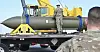 In this photo released by the U.S. Air Force on May 2, 2023, airmen look at a GBU-57, or the Massive Ordnance Penetrator bomb, at Whiteman Air Base in Missouri. [AP/YONHAP]