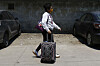 A Honduran migrant who returned voluntarily from the United States walks after arriving at Ramon Villeda Morales Airport in San Pedro Sula, Honduras, on May 19. [AP/YONHAP]