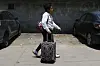 A Honduran migrant who returned voluntarily from the United States walks after arriving at Ramon Villeda Morales Airport in San Pedro Sula, Honduras, on May 19. [AP/YONHAP]