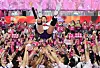 The Heungkuk Life Insurance Pink Spiders toss Kim Yeon-koung into the air after winning the 2024-25 V League Championship at Incheon Samsan World Gymnasium in Incheon on April 8. [NEWS1]