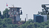 A North Korean guard post and loudspeakers aimed at the South are seen from a border area in Paju, Gyeonggi, on Aug. 4. [WOO SANG-JO]