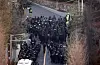 Officials from the Corruption Investigation Office for High-ranking Officials and police enter the presidential residence in Yongsan District, central Seoul, on Jan. 15 on their way to arrest President Yoon Suk Yeol. [YONHAP]