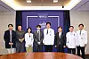 Suga of BTS, fourth from left, poses for photos with medical staff and researchers at Severance Hospital in western Seoul on June 23. [YONHAP]