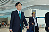 Deputy Prime Minister and Minister of Economy and Finance Koo Yun-cheol departs for Washington via Terminal 2 of Incheon International Airport on Oct. 15, 2025. [YONHAP]