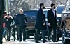 People Power Party lawmaker Yoon Sang-hyun, far left, and other members of President Yoon Suk Yeol's legal defense team and his security detail arrive at the headquarters of the Corruption Investigation Office for High-ranking Officials in Gwacheon, Gyeonggi, on Jan. 15. [JOINT PRESS CORPS]