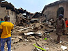 Residents inspect the damage after U.S. forces had launched a strike against Islamic State militants in Nigeria at the request of Nigeria's government, as U.S. President Donald Trump announced on Truth Social on Dec. 25, 2025, in Offa, Kwara State, Nigeria, Dec. 26, 2025. [REUTERS/YONHAP]