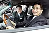 Late President Roh Moo-hyun, right, and Chung Mong-koo, the honorary chairman of Hyundai Motor Group, take a photo in a driving event on March 11, 2005. [YONHAP]