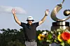 Peter Malnati of the United States accepts the Valspar Championship Trophy after the final round of the Valspar Championship at Copperhead Course at Innisbrook Resort and Golf Club on March 24 in Palm Harbor, Florida. [GETTY IMAGES]