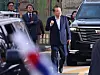 Impeached President Yoon Suk Yeol makes a triumphant fist gesture toward his supporters as he leaves the Seoul Detention Center in Uiwang, Gyeonggi, on March 8. [YONHAP]