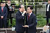 Former Prime Minister Han Duck-soo, left, and People Power Party presidential candidate Kim Moon-soo greet share a hug after their meeting on May 8 at the National Assembly in western Seoul. [YONHAP]