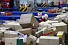 Parcels pile up at a logistics center in Seoul on Aug. 17, the final day of the courier industry’s designated delivery break. [YONHAP]