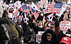 Supporters of President Yoon Suk Yeol hold a rally waving flags of South Korea and the United States near the presidential residence in Hannam-dong in central Seoul on Jan. 12. [LIM HYEON-DONG]
