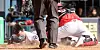 Doosan Bears Jun-Young Park rushes home in the bottom of the 7th inning with runners on 1st and 3rd base, but was tagged out during a KBO preseason game against Kia Tigers in Seoul on March 14. [NEWS1]