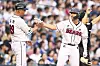 Doosan Bears Park Jun-young high-fives Coach Goto during a KBO League professional baseball game between against the Samsung Lions at Jamsil Baseball Stadium in Songpa-gu, Seoul on July 12. 2024. [NEWS1]