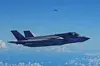 In this image provided by the U.S. Air Force, a Marine Corps F-35B Lightning II aircraft flies alongside a U.S. Air Force B-52H Stratofortress bomber in the U.S. Southern Command area of responsibility, Oct. 15. [AP/YONHAP]