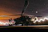 In this U.S. Army photo taken from an undisclosed location on Dec.19, an AH-64 Apache attack helicopter prepares to support Operation Hawkeye Strike in the U.S. Central Command area of responsibility. U.S. forces struck more than 70 Islamic State group targets in Syria on Friday in what U.S. President Donald Trump described as ″very serious retaliation″ for an attack that killed three Americans last weekend. [AFP/YONHAP]