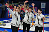 South Korea's Kim Su-ji, Seol Ye-eun, Gim Eun-ji and Kim Min-ji wave to the crowd during the women's curling round robin session against Britain at the 2026 Winter Olympics in Cortina d'Ampezzo, Italy, on Feb. 13. [AP/YONHAP]