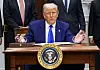 U.S. President Donald Trump takes questions while signing an executive order aiming to lower the cost of prescription drugs during a press conference in the Roosevelt Room of the White House in Washington, D.C. on May 12. [UPI/YONHAP]