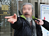 Cho Doo-soon, one of the nation's most notorious child rapists, answers reporters' questions at the Suwon District Court in Suwon, Gyeonggi, on March 11.
