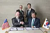 Bill Gates, left in the second row, founder and chairman of TerraPower and Chung Ki-sun, right in the second row, executive vice chairman of HD Hyundai take a commemorative photo after a signing ceremony marking the two companies' partnership to commercialize Natrium reactors in March. [HD HYUNDAI]