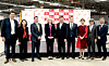 Cho Jae-yeon, fourth from right, head of SK ecoplant's environment business unit, Terrance Ng, fifth from right, CEO of SK tes, and other executives and officials from the Virginia state government take a photo at an opening ceremony of SK ecoplant's hyperscale IT Asset Disposition (ITAD) factory in Fredericksburg, Virginia, on March 13. [SK ECOPLANT]