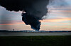 A plume of smoke rises from the site of a UPS cargo plane crash at Louisville Muhammad Ali International Airport on Nov. 4, in Louisville, Kentucky. [AP/YONHAP]