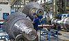 An employee inspects rotors at Doosan Skoda Power's turbine manufacturing factory in Plzen, Czech Republic. [JOINT PRESS CORPS]