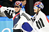 Korean short track speed skaters Park Ji-won, left, and Jang Sung-woo celebrate after finishing the men's 1000-meter final at at Heilongjiang Ice Events Training Center Multifunctional Hall in Harbin, China on Feb. 8. [NEWS1]