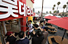 The first customer enters the first U.S. Lotteria outlet in Orange County, California, on Aug. 14. [LOTTE GRS]