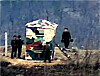 In this photograph released by the South Korean Defense Ministry, North Korean soldiers are seen painting a camouflage pattern on a reconstructed guard post inside the demilitarized zone on Friday, a day after the regime announced it had scrapped an inter-Korean military pact intended to reduce the risk of accidental border clashes. [MINISTRY OF NATIONAL DEFENSE]