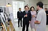 President Lee Jae Myung, center, and first lady Kim Hea Kyung speak with Kim Won-suk, director of Netflix series “When Life Gives You Tangerines,” at the Pine Grass reception hall in front of the Yongsan presidential office in central Seoul on June 30. [PRESIDENTIAL OFFICE]