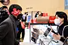 Thirty-nine-year-old Shim Jae-ho, left, became Tim Hortons Korea's first customer, placing an order at the inaugural store on Thursday. Shim had waited for 23 hours, starting from 11 a.m. the day before, to secure the coveted position of being the first customer. [TIM HORTONS KOREA]