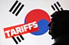 A 3D-printed miniature model of U.S. President Donald Trump, the Korea flag and the word ″Tariffs″ are seen in this illustration taken on July 23. [REUTERS/YONHAP]