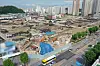 Vehicles pass the site of a deadly building collapse in the southwestern city of Gwangju in this file photo taken June 11, 2021. [YONHAP]