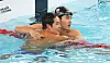 Hwang Sun-woo, right, and Kim Woo-min check their race records after the men's 200-meter freestyle final of the KB Financial Korea Swimming Championship at Gimcheon Indoor Swimming Pool in Gimcheon, North Gyeongsang on March 26. [YONHAP]