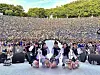 Girl group IVE poses with the audience at Yonsei University's Akaraka spring festival on May 19, 2023. [SCREEN CAPTURE]