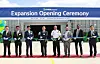 HD Hyundai Electric executives and Alabama state government officials take a photo celebrating the opening of the company's manufacturing plant in the U.S. state in July 2024. [HD HYUNDAI ELECTRIC]