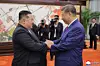 A photo released by the official North Korean Central News Agency (KCNA) shows China's president Xi Jinping, right, shaking hands with North Korean leader Kim Jong-un during a meeting at the Great Hall of the People in Beijing, China, on Sept. 4. [EPA/YONHAP]