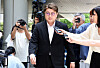 Trot singer Kim Ho-joong enters the Seoul Central District Court in Seocho District, southern Seoul, on May 24, 2024. [NEWS1]