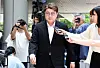 Trot singer Kim Ho-joong enters the Seoul Central District Court in Seocho District, southern Seoul, on May 24, 2024. [NEWS1]