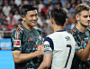 Bayern Munich's Kim Min-jae, left, greets Tottenham Hotspur's Son Heung-min at Seoul World Cup Stadium in western Seoul on Aug. 3. [NEWS1]
