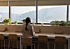 A woman is seen reading a book by herself at a local community center in Incheon [JOONGANG ILBO]
