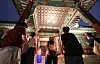 Participants of Changdeok Palace's Moonlight Tour look around the palace grounds after sundown on Sept. 11, 2024. [NEWS1]