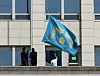Officials lower the phoenix flag, symbolizing the presidential office, at the presidential compound in Yongsan District, central Seoul, on April 4, following the Constitutional Court's decision to remove President Yoon Suk Yeol from office. [JOINT PRESS CORPS]